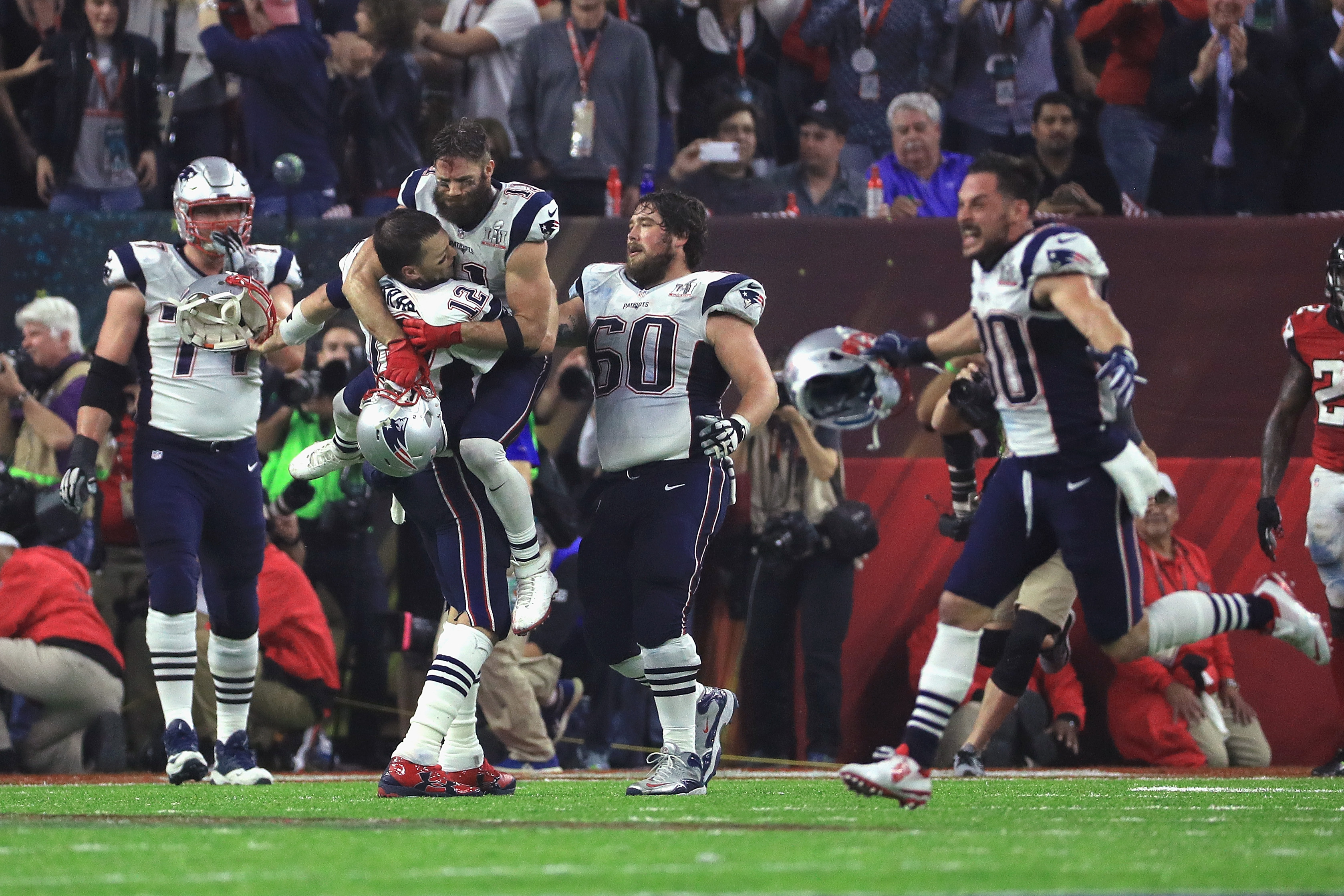 HOUSTON, TX - FEBRUARY 05: Tom Brady #12 of the New England Patriots celebrates after defeating the Atlanta Falcons 34-28 in overtime during Super Bowl 51 at NRG Stadium on February 5, 2017 in Houston, Texas. (Photo by Mike Ehrmann/Getty Images)