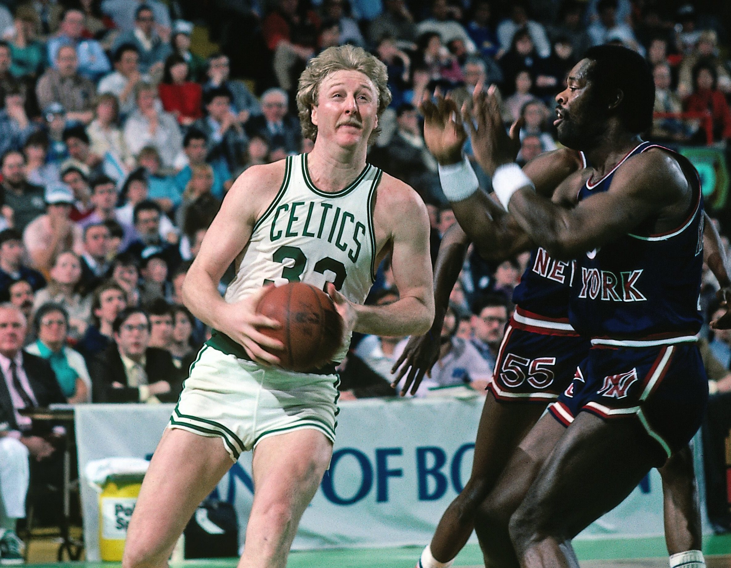 BOSTON - 1983: Larry Bird #33 of the Boston Celtics drives to the basket against the New York Knicks during a game played in 1983 at the Boston Garden in Boston, Massachusetts. NOTE TO USER: User expressly acknowledges and agrees that, by downloading and or using this photograph, User is consenting to the terms and conditions of the Getty Images License Agreement. Mandatory Copyright Notice: Copyright 1983 NBAE (Photo by Dick Raphael/NBAE via Getty Images)